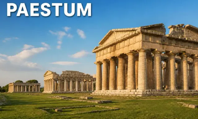 Templi dorici di Paestum, testimoni della Magna Grecia, si ergono maestosi sotto un cielo azzurro.