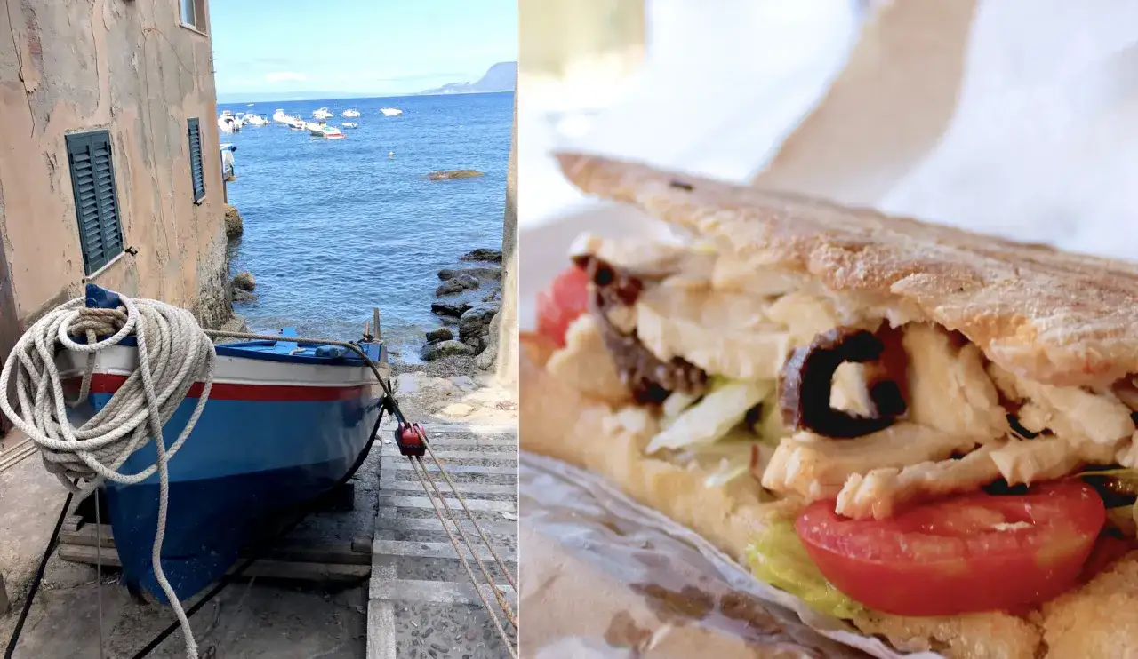 Barca blu e bianca ormeggiata a Scilla, con un panino gustoso. Perfetto per decidere cosa fare a Scilla la sera.